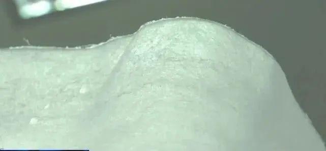 揭秘N95口罩中间层的多孔结构熔喷布，揭秘N95口罩核心材料，多孔结构熔喷布解析